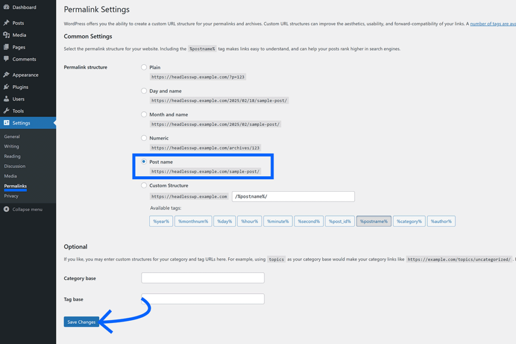 Post name permalink structure selected and arrow pointing to save change button in WordPress admin